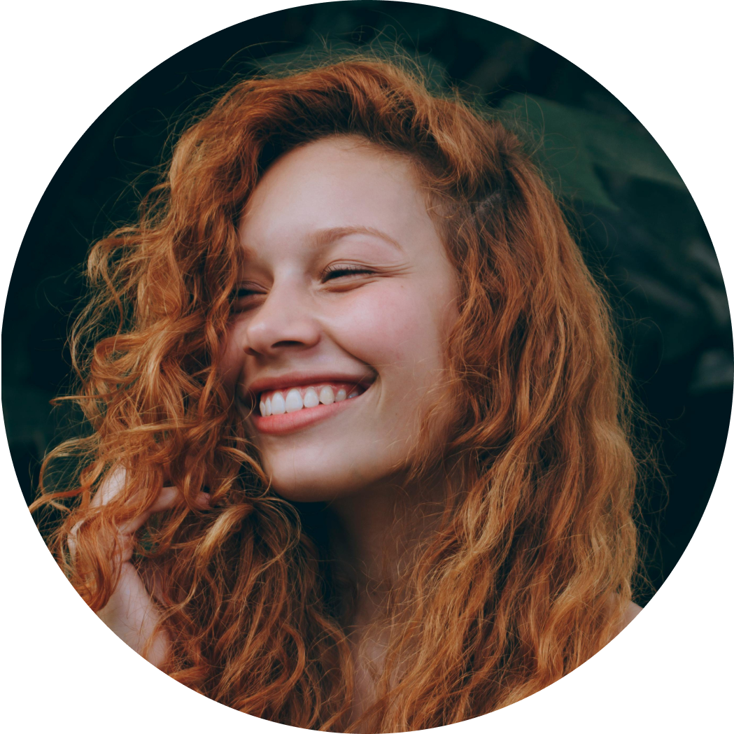 Smiling woman with curly hair