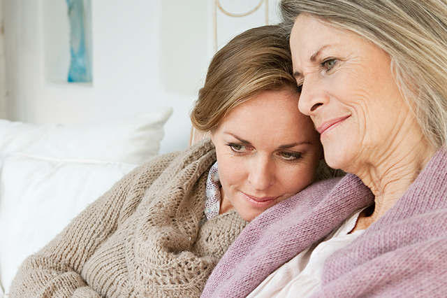 Mother and daughter embracing